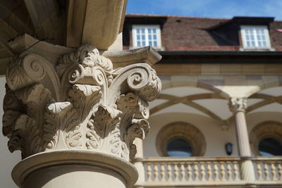 Low angle view of sculpture on building