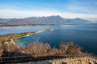 Aerial view of the lake garda with the rabbit island and the garda island from manerba