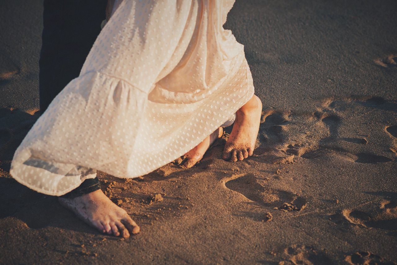 real people, low section, sand, barefoot, high angle view, outdoors, beach, one person, human leg, day, men, adult, adults only, people