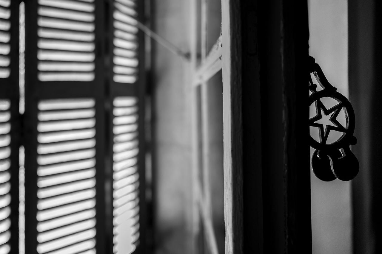 Behind closed shutters Black And White monochrome photography Monochrome Window No People Focus On Foreground Noir Et Blanc Volets Shutters Crémone Selective Focus On Subject Dof Light Shadow Etoile Star Nikon Z7 II