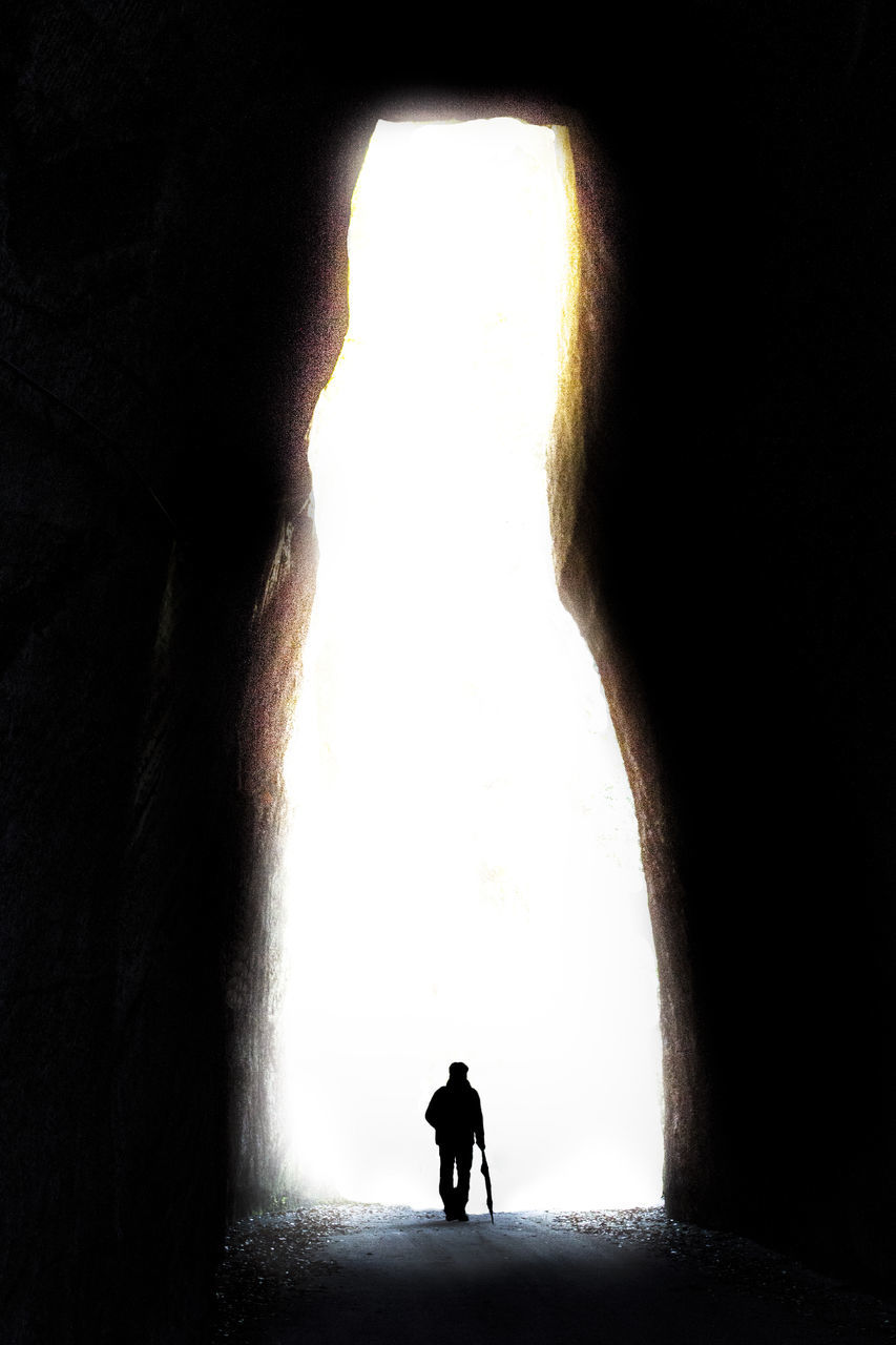 SILHOUETTE MAN IN TUNNEL