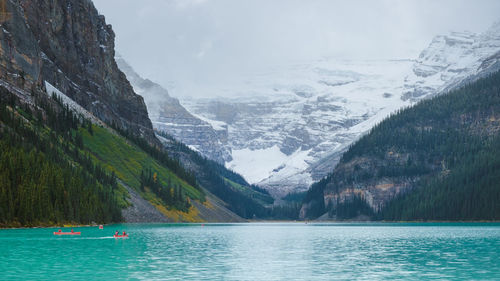 Scenic view of snowcapped mountains against sky