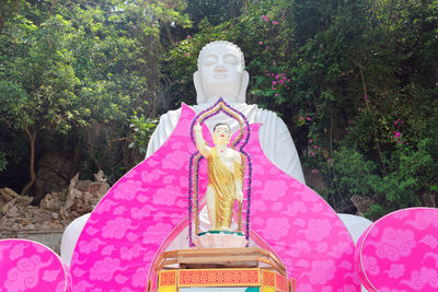 View of statue against trees