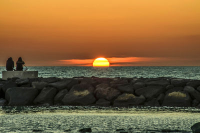 Scenic view of sea during sunset