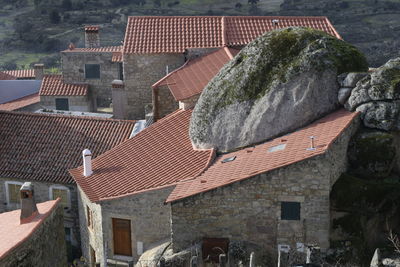 High angle view of houses and buildings in town