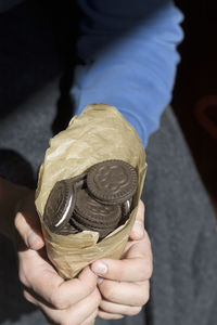 Midsection of person holding ice cream