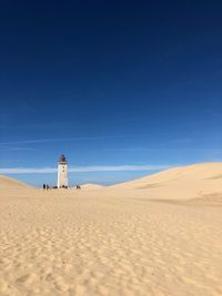 Lighthouse on sand dune