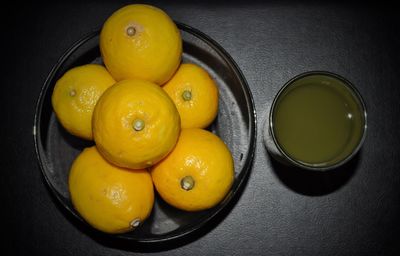 High angle view of fruits in bowl on table