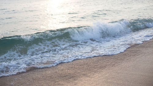 High angle view of wave rushing towards shore