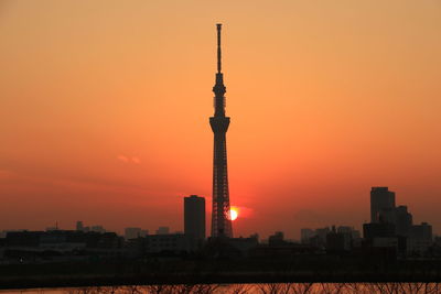 Silhouette of tower at sunset