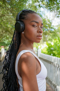 Portrait of young woman looking away