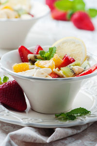 Close-up of fruits in bowl on table