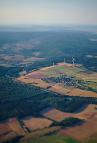 Aerial view of agricultural field against sky