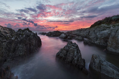 Scenic view of sea against sky during sunset