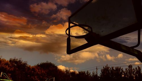 Low angle view of basketball hoop against sky