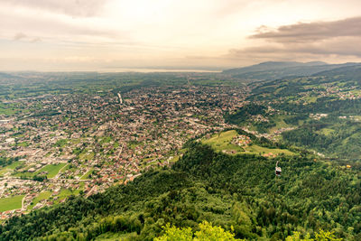 Aerial view of townscape against sky