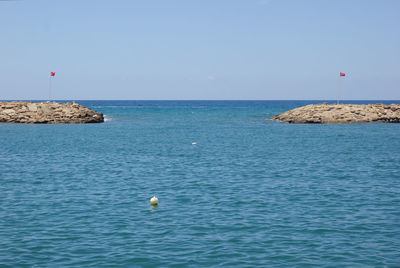 Scenic view of sea against clear sky