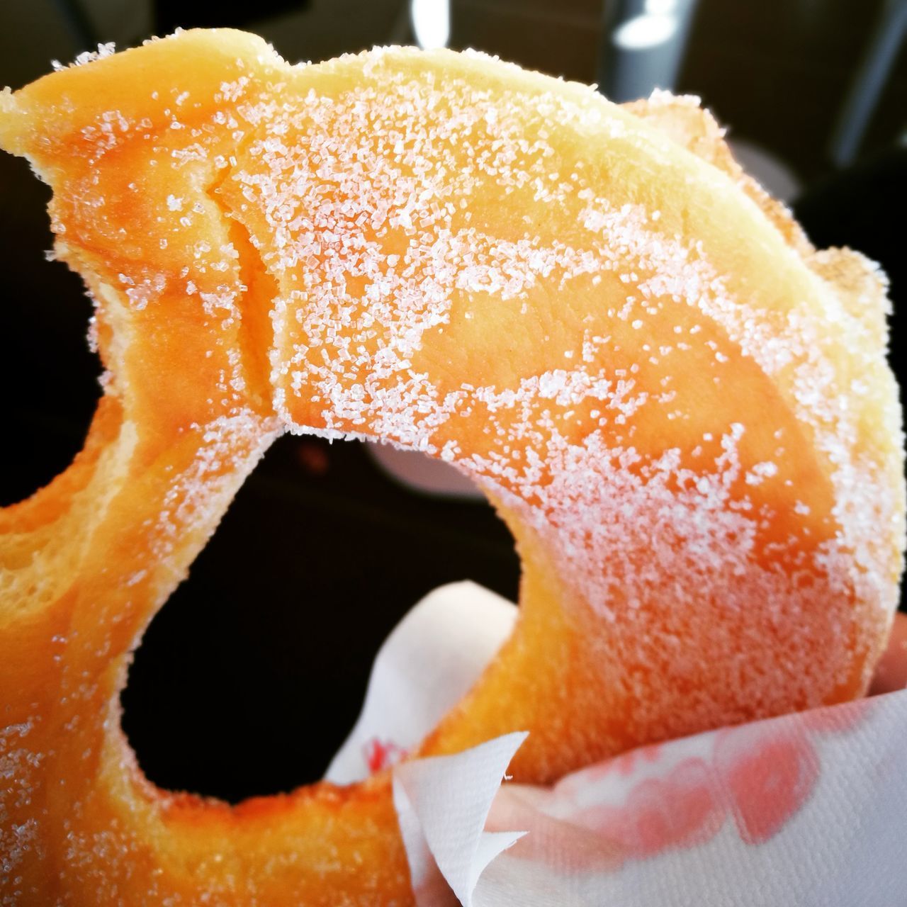 CLOSE-UP OF ORANGE ICE CREAM CONE