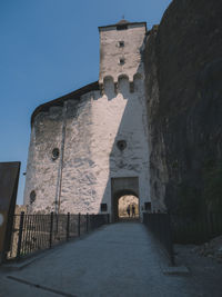 Low angle view of old building against clear sky