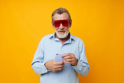 Portrait of senior man wearing sunglasses