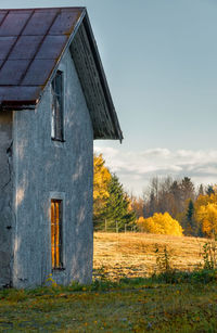 House on field against sky