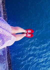 Reflection of woman in water