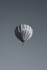 Low angle view of hot air balloon against clear sky