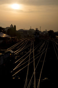 High angle view of railroad tracks at sunset