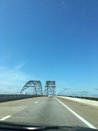 Cars on interstate 24 bridge against sky