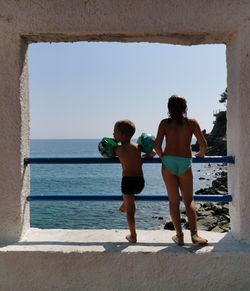 Brother and sister at the sea