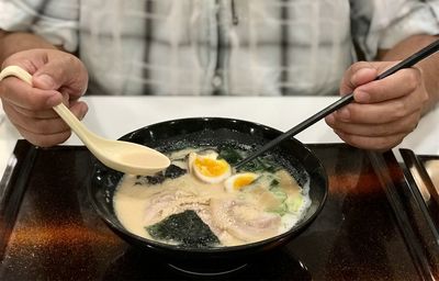 Close-up of hand holding food