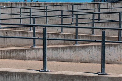 Concrete ramp with metal railing, abstract vision