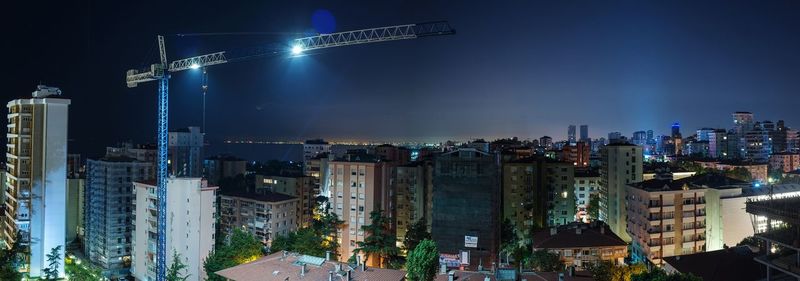 Illuminated cityscape at night