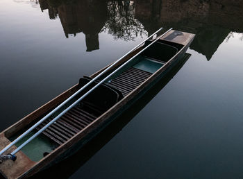 High angle view of boat moored on lake