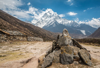 Scenic view of snowcapped mountains against sky