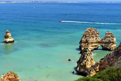 High angle view of rocks in sea