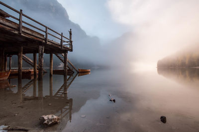 Low angle view of pier over calm lake