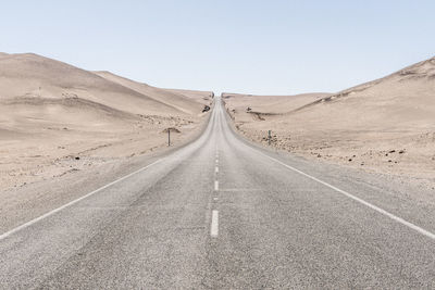 View of road along desert against sky