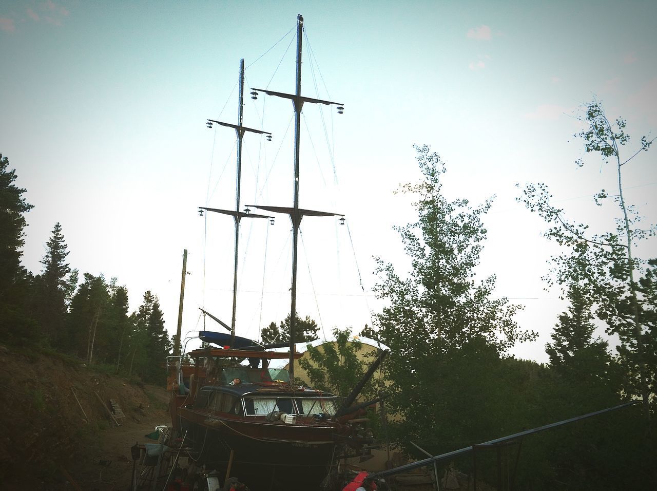 LOW ANGLE VIEW OF SHIPS AGAINST SKY