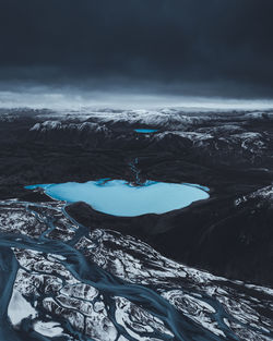 Scenic view of frozen lake against sky
