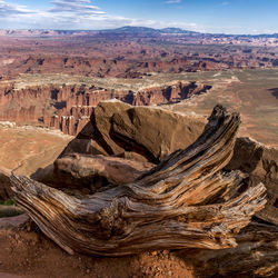 Aerial view of rock formations on landscape against sky