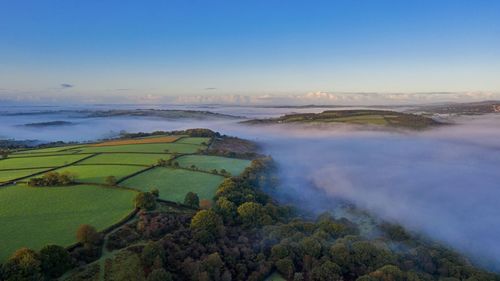 Scenic view of land against sky
