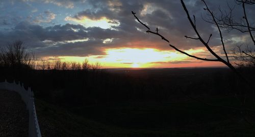 Scenic view of landscape at sunset