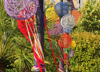 Close-up of multi colored decoration hanging outdoors
