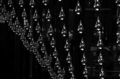 Low angle view of lit lamps