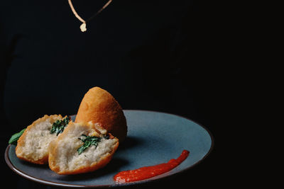 Close-up of food against black background