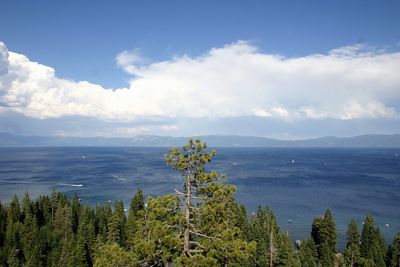 Scenic view of mountains against cloudy sky