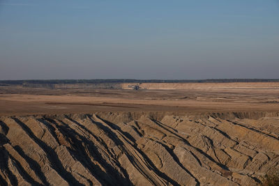 Scenic view of desert against sky