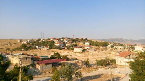 High angle view of houses against clear sky