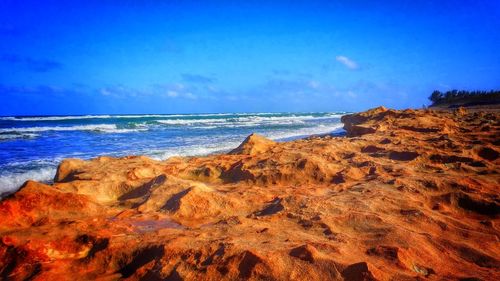 Scenic view of beach against sky